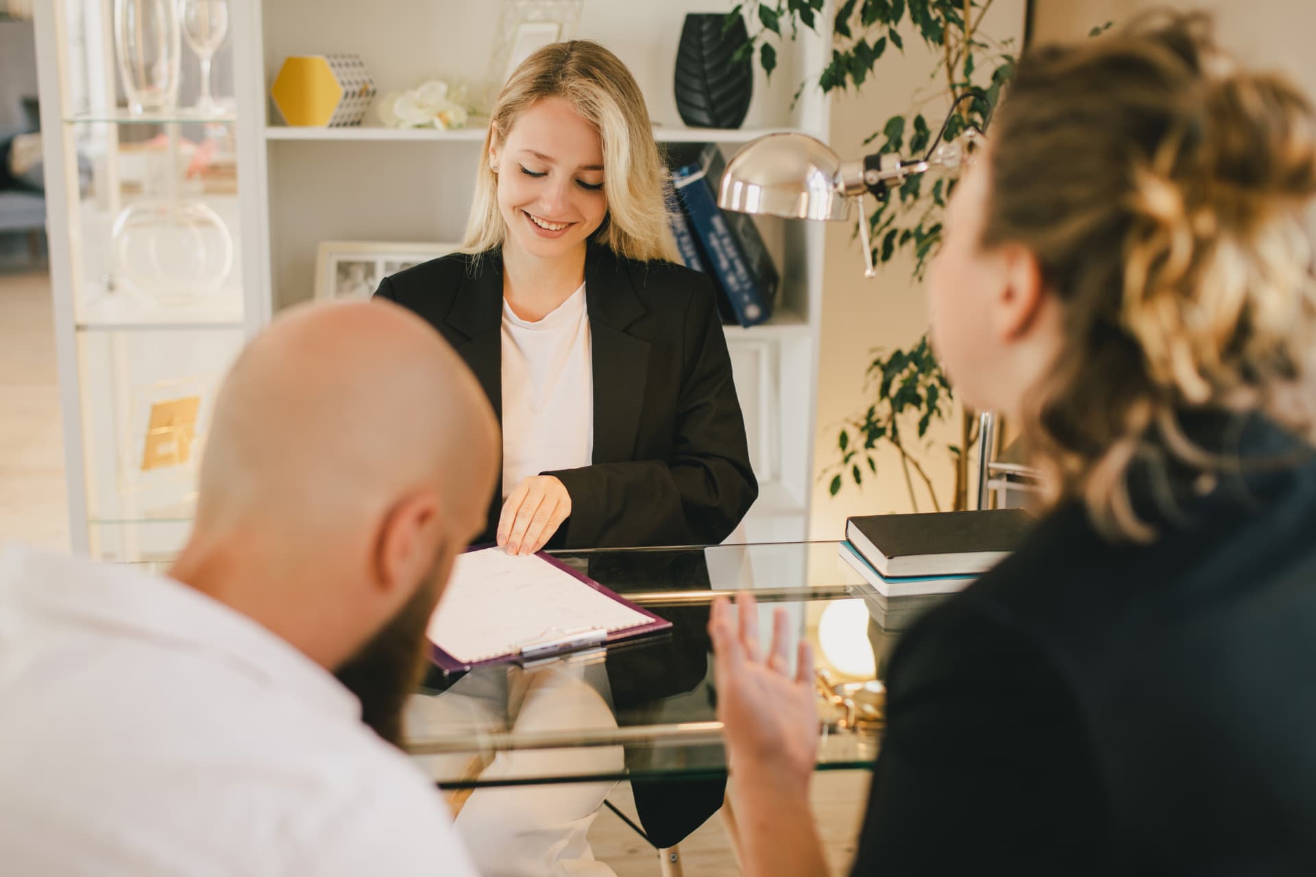 Attorney reviewing closing documents with clients